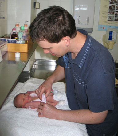 Evie being dressed after her first bath