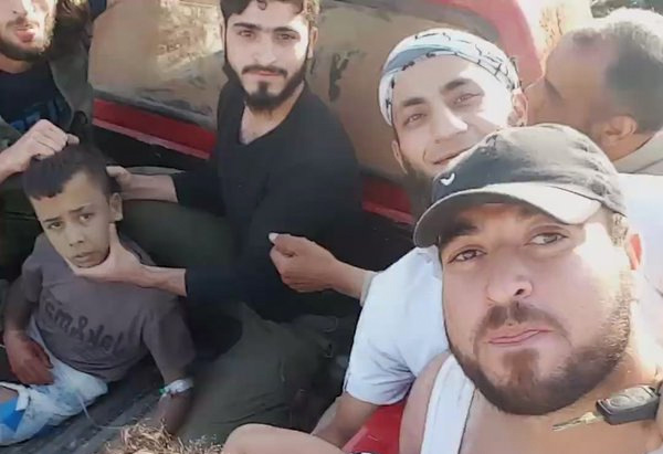 Fuller photo of Abdullah held captive by US armed Nour al-Din al-Zinki (&quot;moderates&quot;) who beheaded him shortly after.