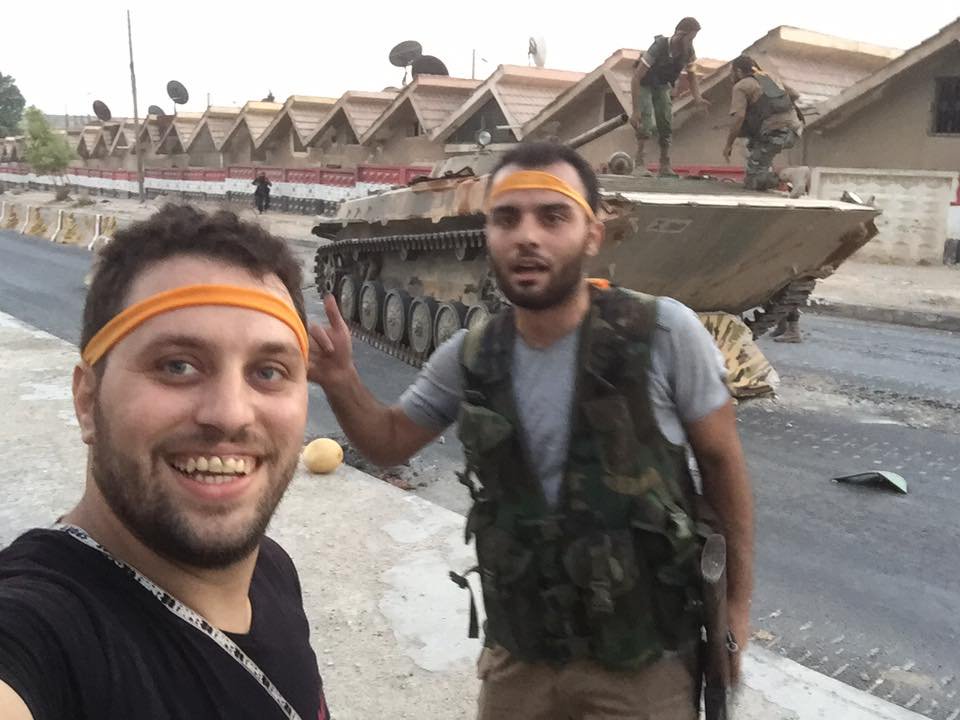 Smiling along side terrorists who beheaded boy